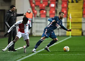 Calum Chambers vs. Peter Olayinka: A Battle in the Empty Eden Arena - UEFA Europa League Quarterfinal