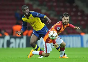 Galatasaray V Arsenal 2014/15 Prints: Campbell vs Colak: Clash of the Wings in Istanbul - Galatasaray vs Arsenal