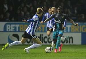 Sheffield Wednesday V Arsenal - Capital One Cup 2015-16 Prints: Campbell vs Loovens: A Football Rivalry in the Capital One Cup - Sheffield Wednesday vs Arsenal