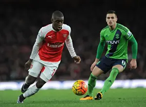 Arsenal V Southampton 2015-16 Prints: Campbell vs Tadic: A Premier League Battle at Emirates Stadium