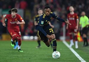 Liverpool v Arsenal - Carabao Cup 2019-20 Collection: Carabao Cup Showdown: Liverpool vs. Arsenal - Joe Willock's Arsenal at Anfield