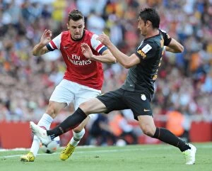 Arsenal v Galatasaray 2013-14 Collection: Carl Jenkinson (Arsenal) Albert Riera (Galatasaray). Arsenal 1: 2 Galatasaray. Emirates Cup Day Two