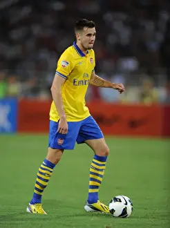 Vietnam V Arsenal 2013-14 Prints: Carl Jenkinson: Arsenal Star in Action against Vietnam (2013-14)