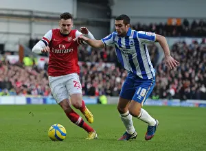 Brighton And Hove Albion V Arsenal FA Cup 2012-13 Prints: Carl Jenkinson vs Gary Dicker: Battle in the FA Cup Fourth Round between Brighton & Hove Albion and Arsenal