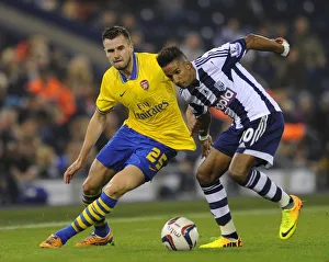 West Bromwich Albion V Arsenal 2013-14 - Capital Cup Prints: Carl Jenkinson vs. Scott Sinclair: Arsenal's Defensive Battle at West Bromwich Albion (Capital One Cup)