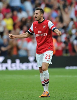 Carl Jenkinson's Celebration: Arsenal vs. Tottenham Rivalry in the Premier League (2013)