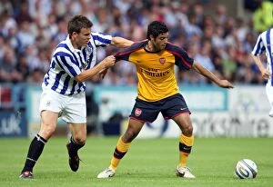 Huddersfield v Arsenal 2008-09 Collection: Carlos Vela (Arsenal) Andy Butler (Huddersfield)