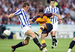 Huddersfield v Arsenal 2008-09 Collection: Carlos vela (Arsenal) Andy Butler (Huddersfield)
