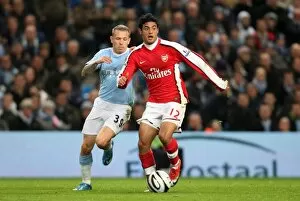 Images Dated 2nd December 2009: Carlos Vela (Arsenal) Craig Bellamy (Man City). Manchester City 3: 0 Arsenal