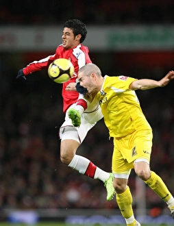Images Dated 16th February 2009: Carlos Vela (Arsenal) Darren Purse (Cardiff)