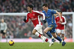 Images Dated 28th December 2008: Carlos Vela (Arsenal) David Nugent (Portsmouth)