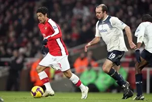 Images Dated 10th January 2009: Carlos Vela (Arsenal) Gavin McCann (Bolton)