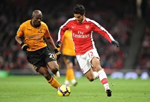 Images Dated 19th December 2009: Carlos Vela (Arsenal) George Boateng (Hull). Arsenal 3: 0 Hull City, Barclays Premier league