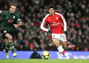Images Dated 3rd January 2009: Carlos Vela (Arsenal) Karl Duguid (Plymouth)