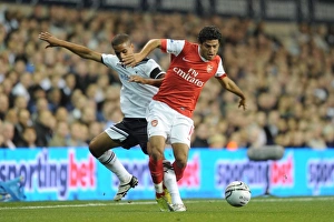 Tottenham Hotspur v Arsenal - Carling Cup 2010-11 Collection: Carlos Vela (Arsenal) Kyle Naughton (Tottenham). Tottenham Hotspur 1: 4 Arsenal (aet)
