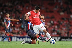 Arsenal v SC Braga 2010-11 Collection: Carlos Vela (Arsenal) Lima (Braga). Arsenal 6: 0 SC Braga, UEFA Champions League