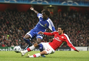 Images Dated 25th November 2008: Carlos Vela (Arsenal) Pape Diakhate (Dynamo Kyiv)