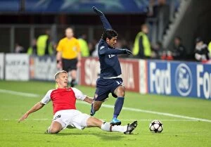 Images Dated 20th October 2009: Carlos Vela (Arsenal) Pontus Wernbloom (AZ Alkmaar)
