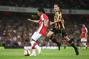 Images Dated 27th September 2008: Carlos Vela (Arsenal) Richard Garcia (Hull)