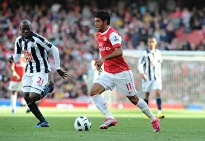 Images Dated 25th September 2010: Carlos Vela (Arsenal) Youssouf Mulumbu (WBA). Arsenal 2: 3 West Bromwich Albion