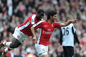 Arsenal v Fulham 2009-10 Collection: Carlos Vela celebrates scoring the 4th Arsenal goal with Emmanuel Eboue