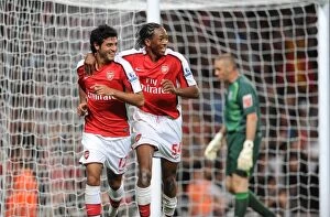 Images Dated 22nd September 2009: Carlos Vela celebrates scoring Arsenals 2nd goal with Sanchez Watt