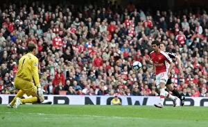 Arsenal v Fulham 2009-10 Collection: Carlos Vela chips the ball over Fulham goalkeeper Mark Schwarzer to score the 4th Arsenal goal
