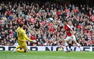 Images Dated 9th May 2010: Carlos Vela chips the ball over Fulham goalkeeper Mark Schwarzer to score the 4th Arsenal goal