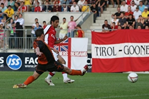 Burgenland XI v Arsenal Gallery: Carlos Vela shoots past Burgenland goalkeeper Johannes