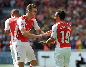 Arsenal V Manchester City - FA Community Shield 2014/15 Prints: Cazorla and Chambers Celebrate Arsenal's First Goal Against Manchester City - FA Community Shield 2014/15