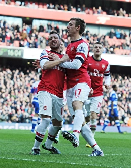 Arsenal V Reading 2012-13 Prints: Celebrating Glory: Unforgettable Moment of Victory - Santi Cazorla and Nacho Monreal's Goal Dance for Arsenal vs