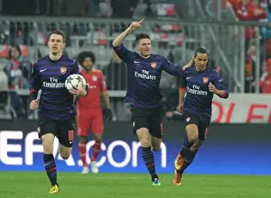 Bayern Munich V Arsenal 2012-13 Prints: Celebrating Glory: Arsenal's Unforgettable Goal Against Bayern Munich - Giroud and Walcott's Emotional Reaction
