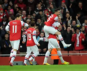 Arsenal V Hull City 2013-14 Prints: Celebrating Glory: Bendtner and Jenkinson's Goal Connection (Arsenal vs Hull City)