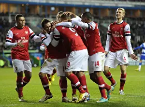 Reading V Arsenal 2012-13 Prints: Celebrating Glory: Cazorla and Podolski's Euphoric Dance after Arsenal's Thrilling Victory at Reading (2012-13)