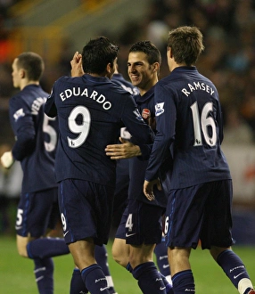 Celebrating Glory: Fabregas, Ramsey, and Eduardo's Unforgettable Goal Fest at Molineux (4-1 Arsenal)