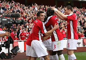 Celebrating Glory: Fabregas, Van Persie, Eduardo, Vermaelen, and Sagna Rejoice in Arsenal's 3-0 Victory over Tottenham