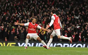Celebrating Glory: Fabregas and Walcott Rejoice in Arsenal's 3:1 Victory over Chelsea