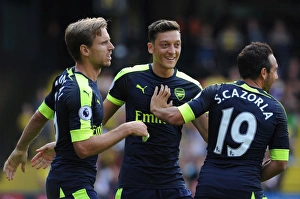Watford V Arsenal 2016-17 Prints: Celebrating Glory: The Goal Connection of Cazorla