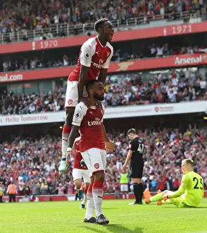 Arsenal V West Ham United 2017-18 Prints: Celebrating Glory: Lacazette and Welbeck's Goal Triumph over West Ham United (Arsenal vs)