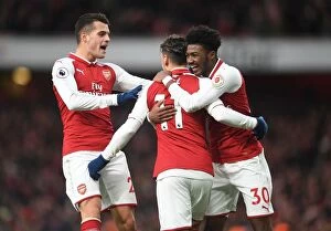 Images Dated 16th December 2017: Celebrating Glory: Ozil, Xhaka, and Maitland-Niles Rejoice in Arsenal's Goal vs