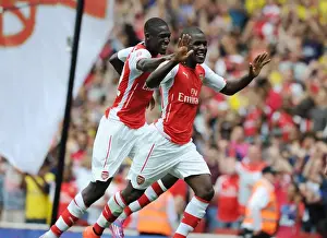 Arsenal V Benfica 2014-15 Prints: Celebrating Victory: Campbell and Sanogo's Goal Connection at Arsenal's Emirates Cup (vs Benfica)