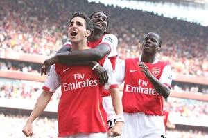 Celebrating Victory: Fabregas, Adebayor, and Eboue Rejoice After Arsenal's Winning Goal vs Bolton Wanderers (04/04/2007)