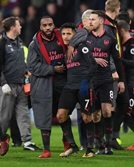 Images Dated 26th November 2017: Celebrating Victory: Lacazette and Sanchez's Jubilant Moment after Arsenal's Win against Burnley