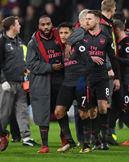 Burnley V Arsenal 2017-18 Prints: Celebrating Victory: Lacazette and Sanchez's Jubilant Moment after Arsenal's Win against Burnley