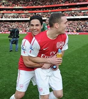 Images Dated 26th February 2012: Celebrating Victory: Mikel Arteta and Thomas Vermaelen, Arsenal FC