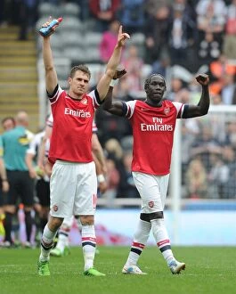 Newcastle United Collection: Celebrating Victory: Ramsey and Sagna's Moment of Triumph after Arsenal's Win at Newcastle United
