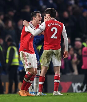 Chelsea v Arsenal 2019-20 Collection: Celebrating Victory: Xhaka and Bellerin Rejoice After Arsenal's Win Against Chelsea