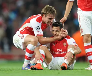 Arsenal V Besiktas 2014/15 Prints: Celebration at Emirates: Monreal and Sanchez Reunite After Arsenal's UEFA Champions League Victory