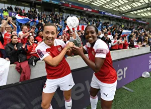 Celebration: McCabe and Carter's Winning Moment for Arsenal Women vs. Brighton & Hove Albion