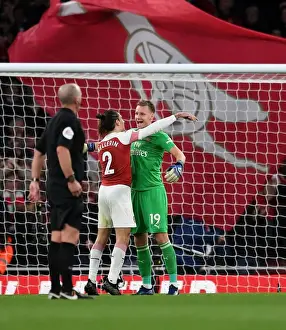 Celebration Time: Leno and Bellerin Rejoice in Arsenal's Victory over Tottenham